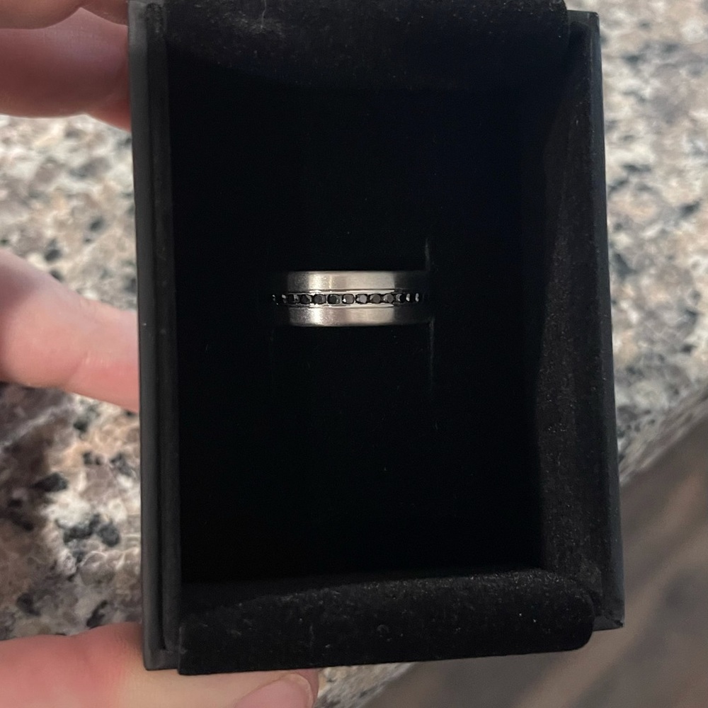 Custom platinum men’s ring with black diamonds